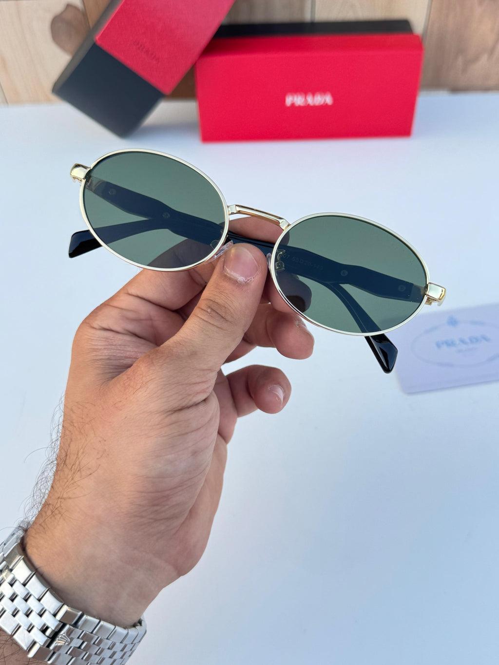 PRADA SUNGLASSES