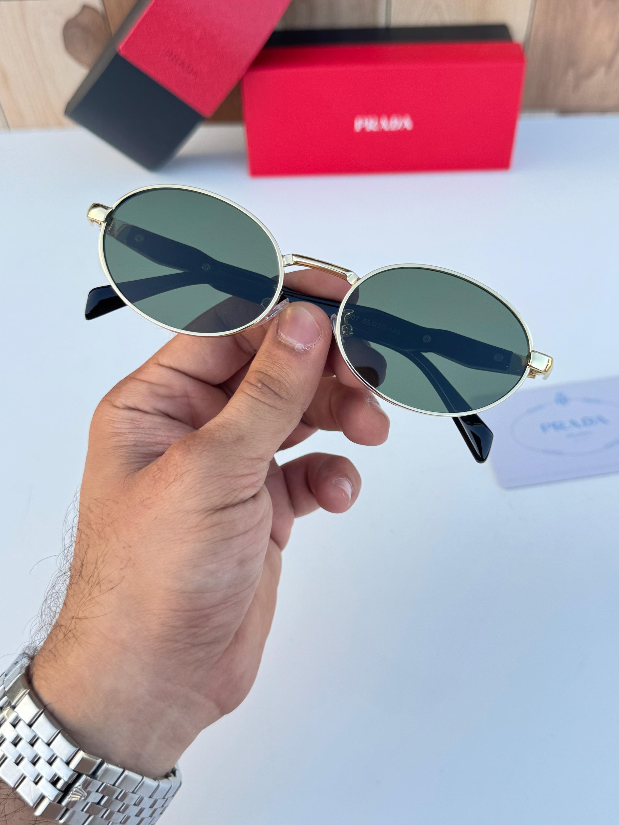PRADA SUNGLASSES