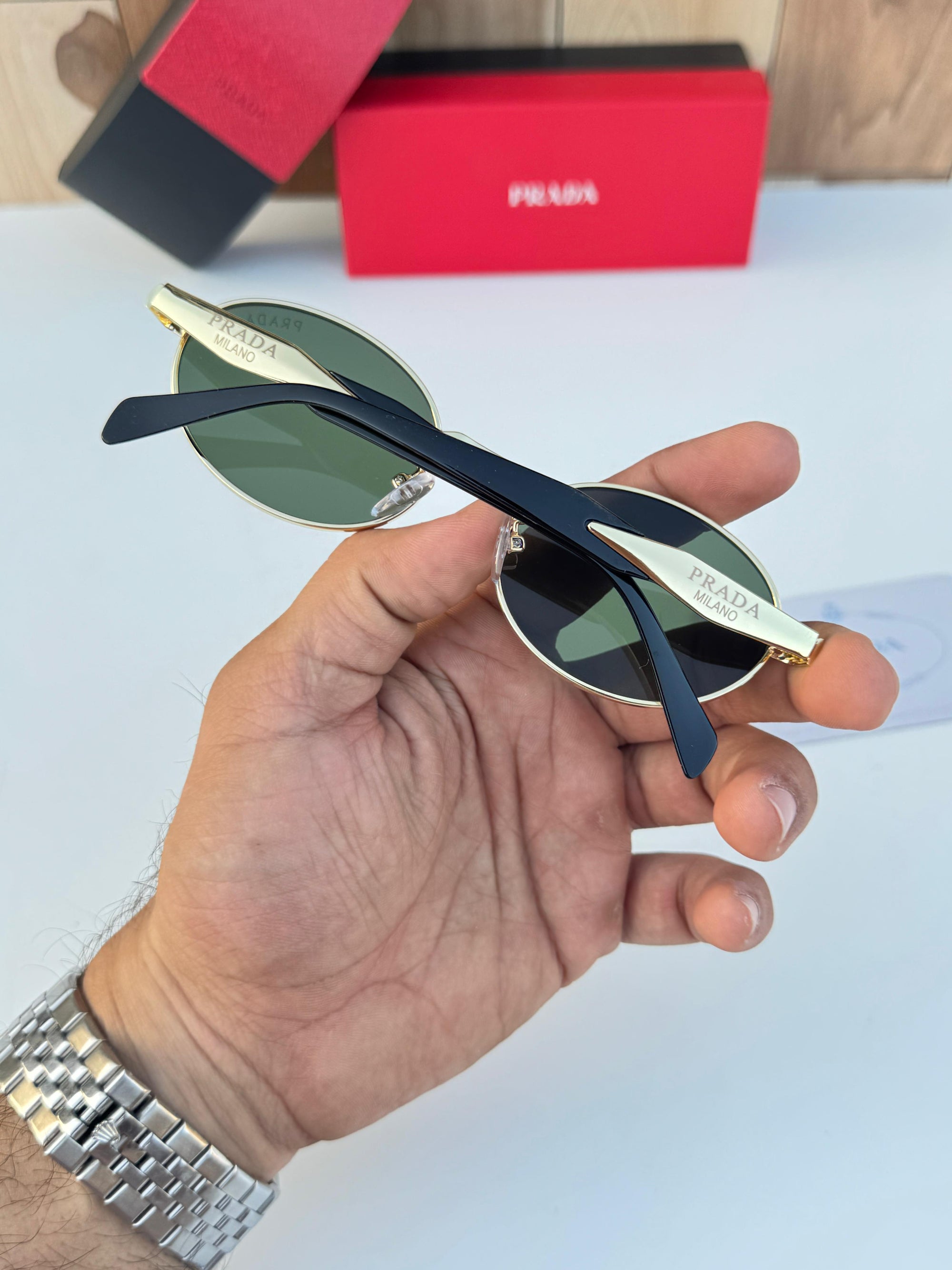 PRADA SUNGLASSES