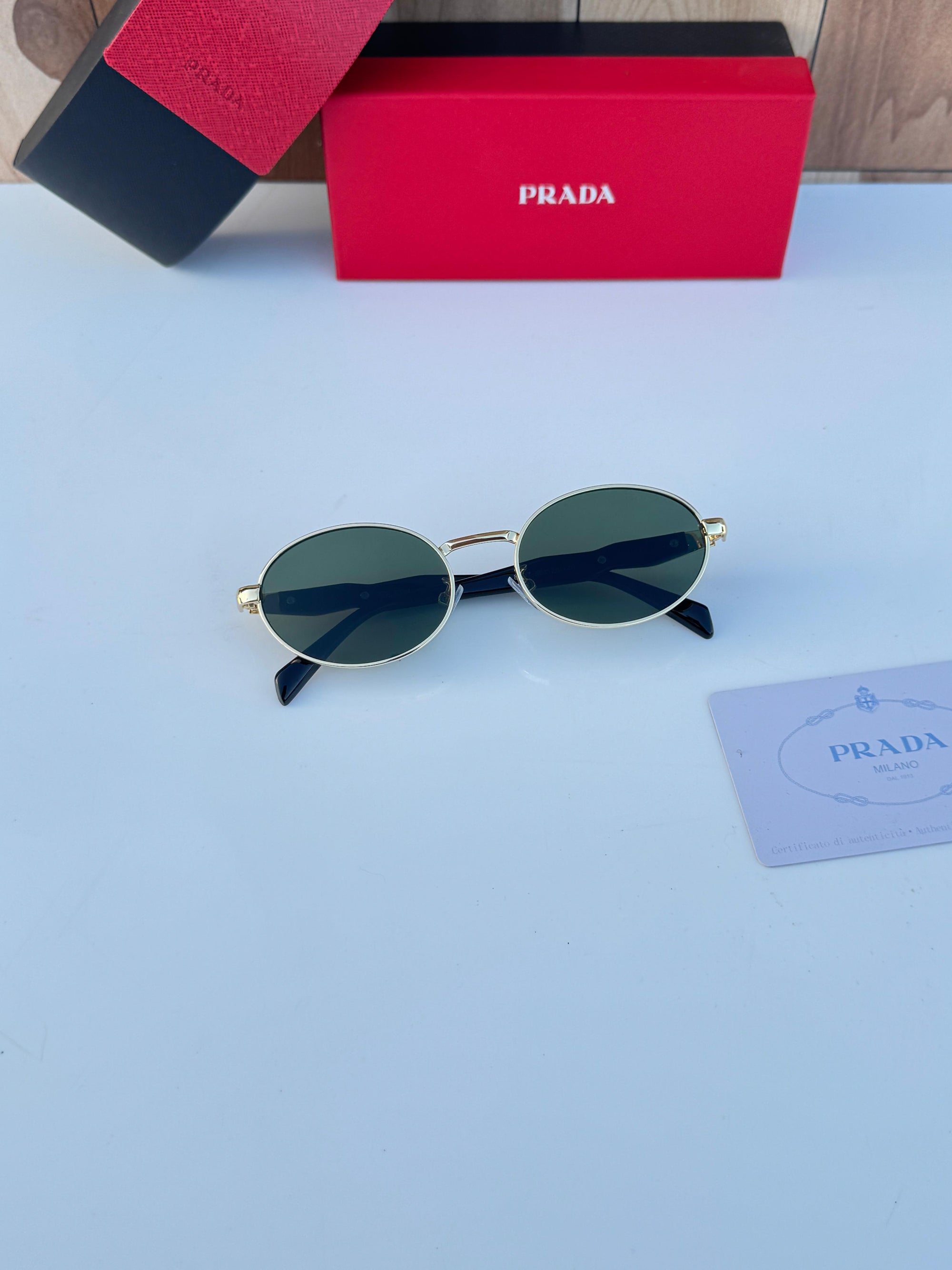 PRADA SUNGLASSES