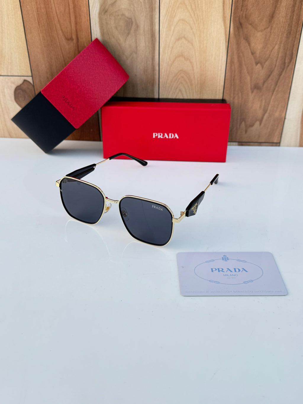 PRADA SUNGLASSES