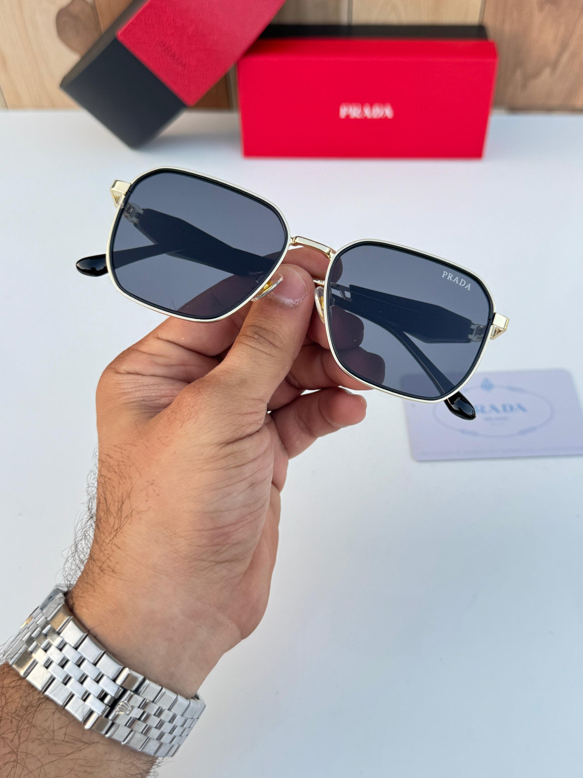 PRADA SUNGLASSES