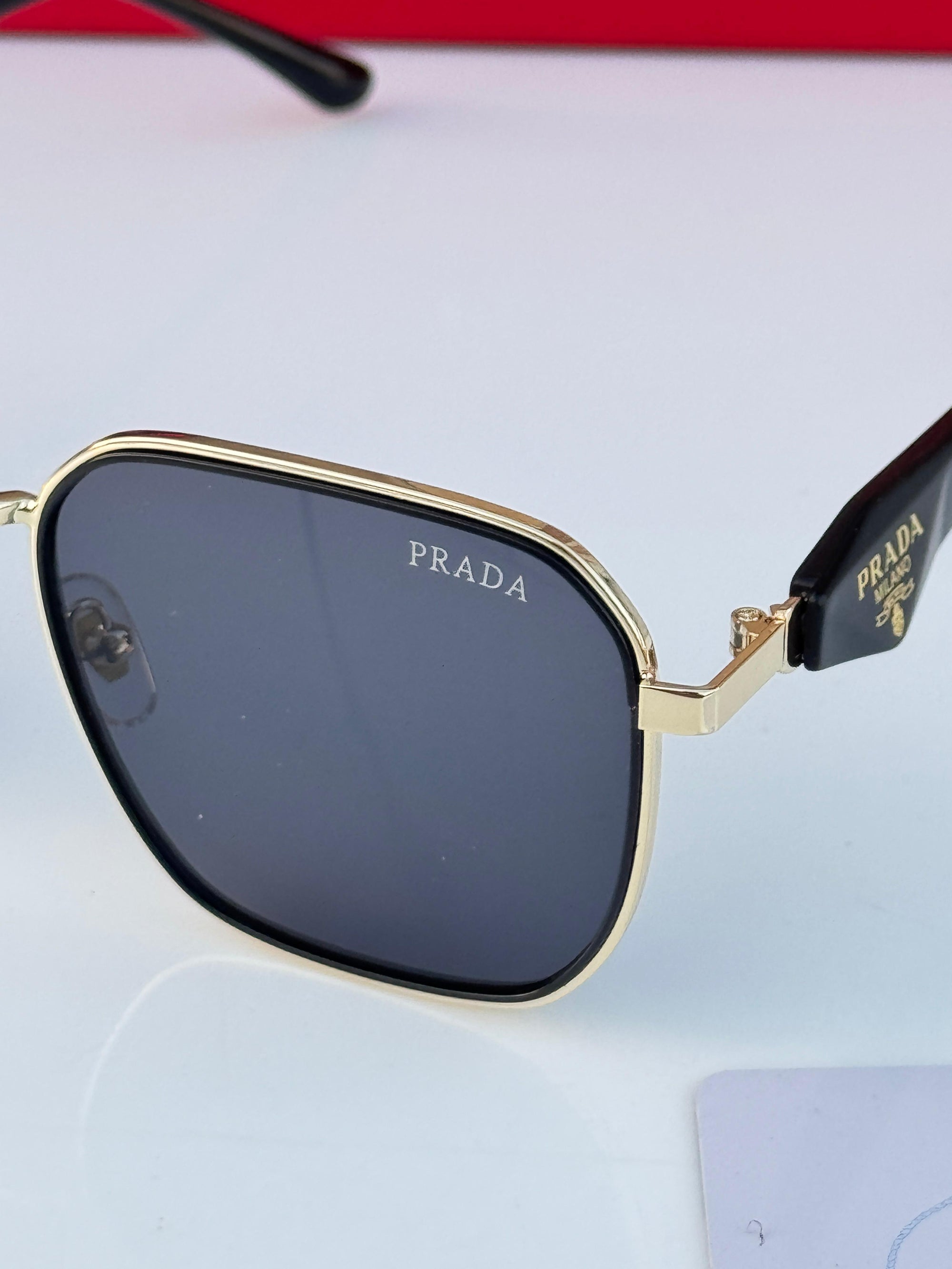 PRADA SUNGLASSES