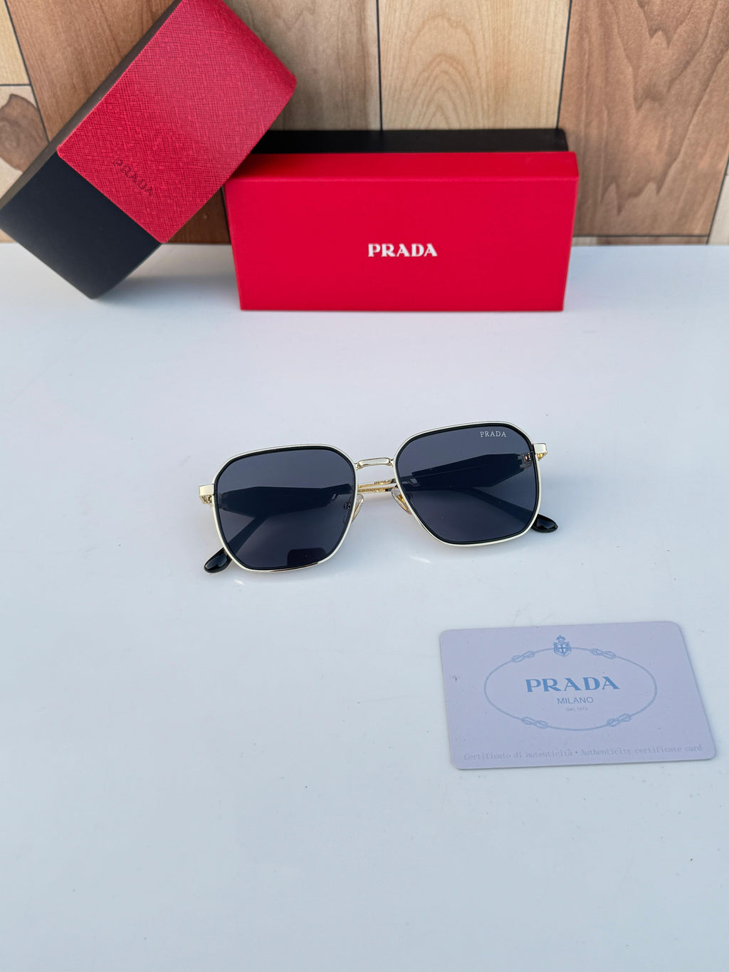 PRADA SUNGLASSES