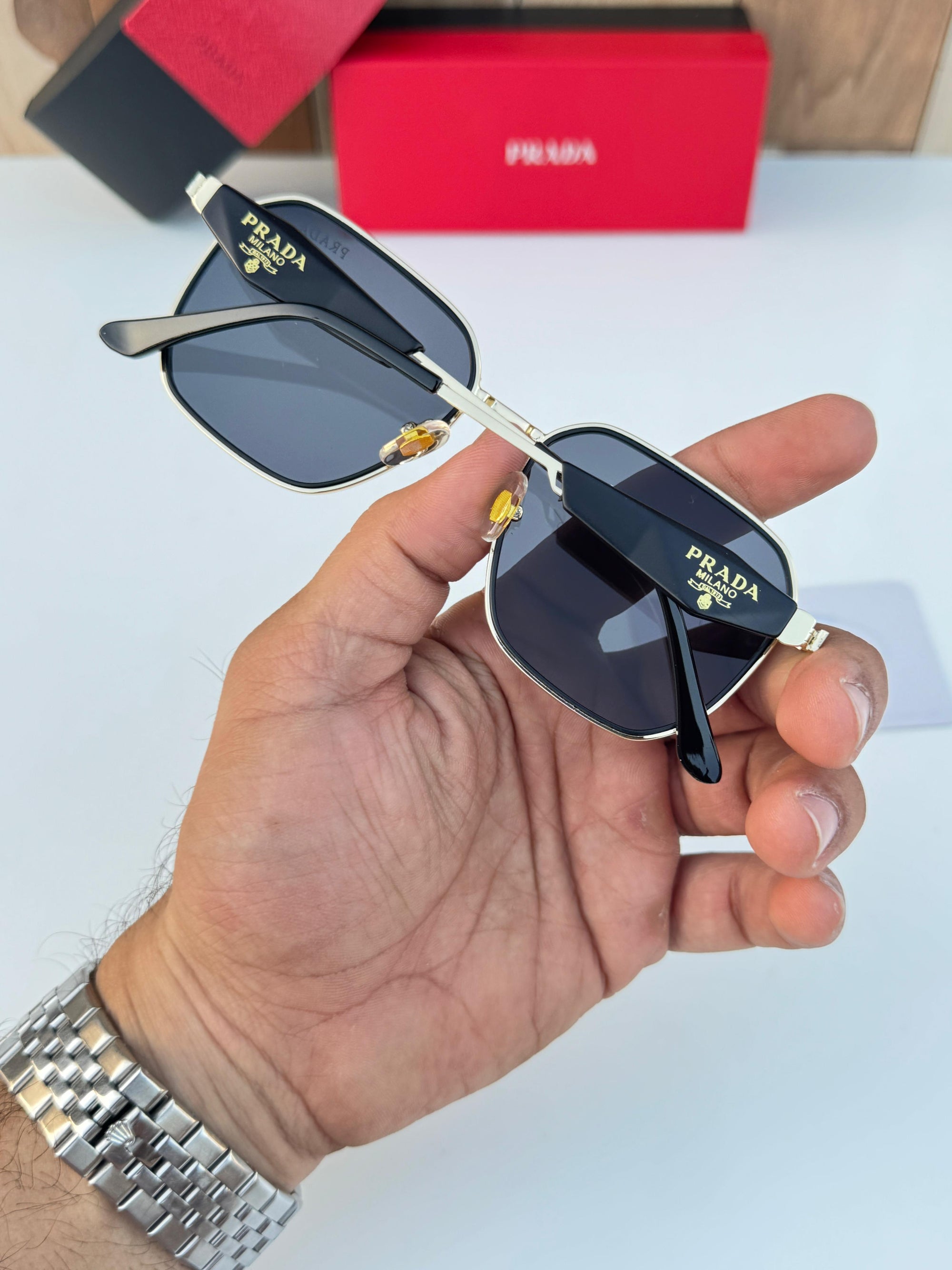 PRADA SUNGLASSES